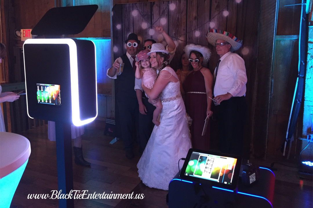 Black Tie Entertainment open air style photo booth Black Tie Entertainment at the Barn on Enchanted Acres
